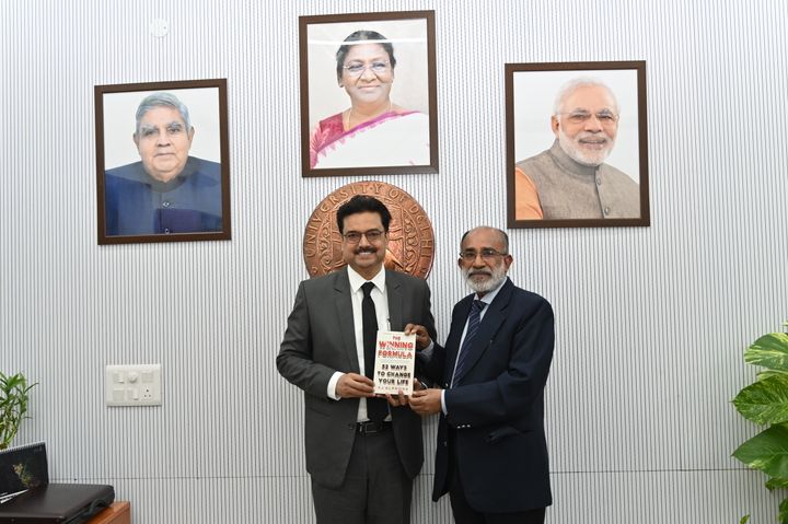 DU VC, congratulates Sh. K.J. Alphons for his pioneering book “The Winning Formula-52 Ways To Change Your Life”